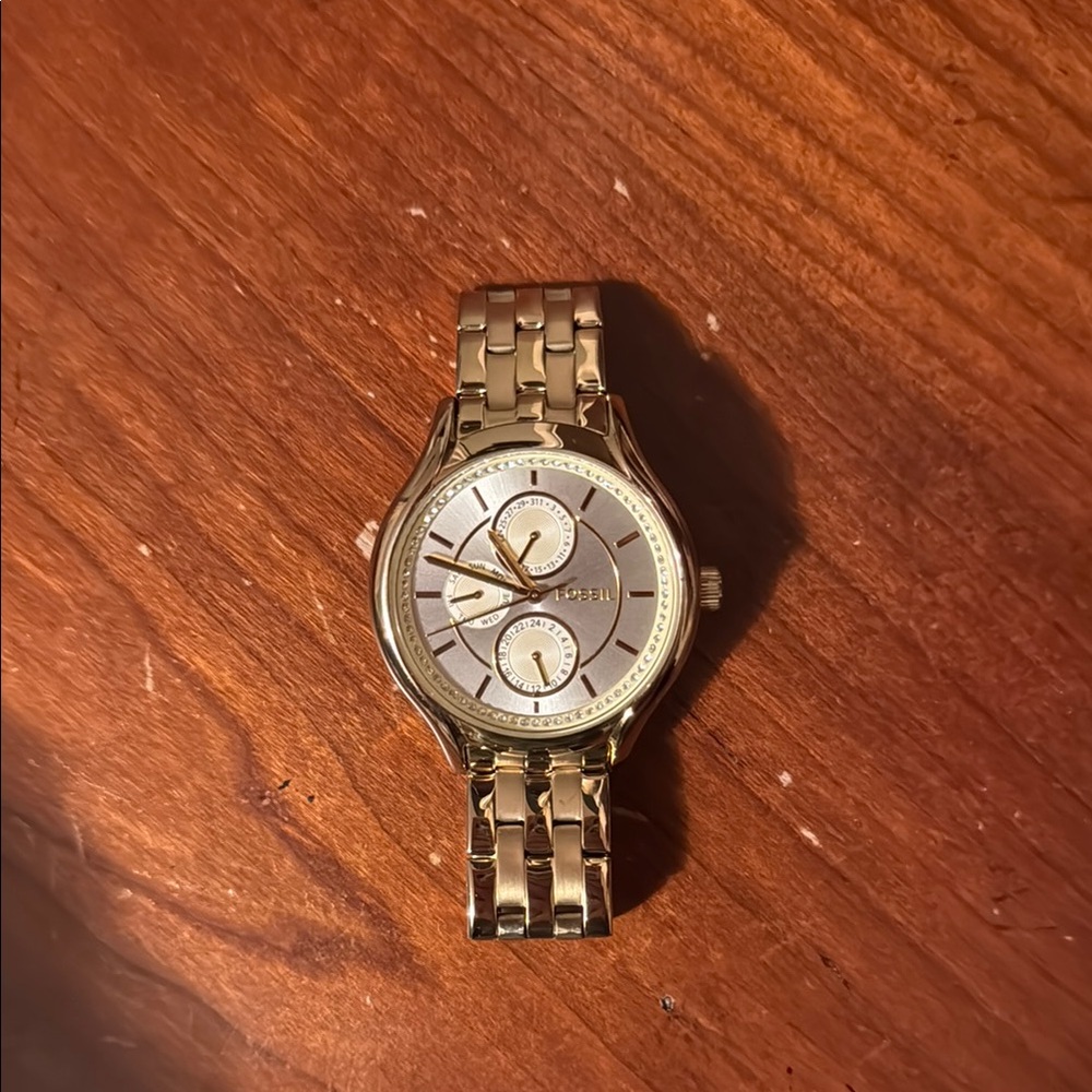 Gold Fossil Watch with Silver Dial